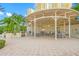 Outdoor kitchen featuring a shaded seating area and grill at 1200 Gulf Blvd # 404, Clearwater Beach, FL 33767