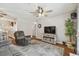 Cozy living room featuring a comfortable seating area and stylish décor at 12106 Meadow Ln, San Antonio, FL 33576