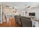 Open concept living room area and kitchen area with a dining room table at 12106 Meadow Ln, San Antonio, FL 33576