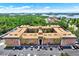 Expansive aerial view of the condo complex near lush greenery and waterways at 12760 Indian Rocks Rd # 578, Largo, FL 33774