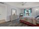 Bedroom with coastal decor, dresser, and plenty of natural light creating a serene atmosphere at 12760 Indian Rocks Rd # 578, Largo, FL 33774