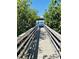 Community boardwalk leads to a waterfront view at 12760 Indian Rocks Rd # 578, Largo, FL 33774
