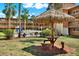 Community tiki hut with picnic table at 12760 Indian Rocks Rd # 578, Largo, FL 33774