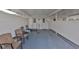 Carport entrance to home with seating area and close access to the unit at 1304 Burbank Ct, Sun City Center, FL 33573