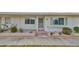 Charming single story home featuring a well-maintained exterior with landscaped front yard and welcoming entrance at 1304 Burbank Ct, Sun City Center, FL 33573