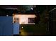 Aerial view of a backyard featuring a gazebo, patio furniture, and well-manicured lawn at 1357 S Betty Ln, Clearwater, FL 33756