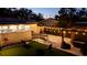 Expansive backyard featuring a gazebo, patio furniture, and well-manicured lawn at 1357 S Betty Ln, Clearwater, FL 33756