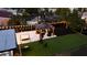 Well-appointed backyard with a gazebo, patio, seating, and lush green lawn at 1357 S Betty Ln, Clearwater, FL 33756