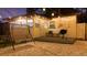 Inviting backyard with string lights, patio, and comfortable seating area at 1357 S Betty Ln, Clearwater, FL 33756
