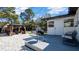 Backyard featuring a gazebo, patio, a grill, and a porch at 1357 S Betty Ln, Clearwater, FL 33756