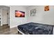 Bright bedroom features natural light and modern floors at 1357 S Betty Ln, Clearwater, FL 33756