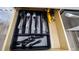 Organized kitchen drawer showing silverware in a tray, for easy storage and convenience at 1357 S Betty Ln, Clearwater, FL 33756