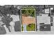 Aerial view of home with mature trees and landscaping, in the neighborhood of 1453 62nd Terrace S, Saint Petersburg, FL 33705 at 1453 62Nd S Ter, St Petersburg, FL 33705
