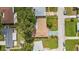 Charming single Gathering home with mature landscaping, a long driveway, and a well maintained lawn at 1453 62Nd S Ter, St Petersburg, FL 33705