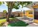 Backyard with patio featuring seating and a grill, and greenery at 1453 62Nd S Ter, St Petersburg, FL 33705