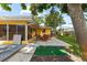 Spacious backyard featuring an outdoor patio and lush lawn area at 1453 62Nd S Ter, St Petersburg, FL 33705