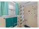 Updated bathroom featuring a shower with decorative tile at 1453 62Nd S Ter, St Petersburg, FL 33705