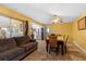 Bright and airy living room showcasing an open floor plan and seamless access to the kitchen at 1453 62Nd S Ter, St Petersburg, FL 33705