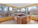 Enclosed spa room with a tiled floor at 1453 62Nd S Ter, St Petersburg, FL 33705