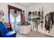View of an additional bedroom closet and dresser featuring a decorated display of assorted accessories at 14985 Alan Ct, Largo, FL 33771