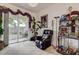 Cozy living room featuring a comfortable leather recliner and curated decorations at 14985 Alan Ct, Largo, FL 33771