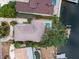An aerial view showing the home, pool, dock, and waterfront location at 150 Carlyle Dr, Palm Harbor, FL 34683