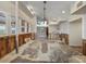 Bright living room with large windows and potential for customization, awaiting remodel and design choices at 150 Carlyle Dr, Palm Harbor, FL 34683