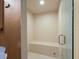 Tiled shower with seat at 150 Carlyle Dr, Palm Harbor, FL 34683