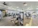 Full view of modern gym featuring a variety of workout equipment to meet all fitness needs at 16101 Cape Coral Dr, Wimauma, FL 33598