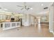 Open-concept kitchen offering a view of the dining and living room, great for entertaining at 16101 Cape Coral Dr, Wimauma, FL 33598