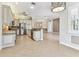 Spacious kitchen with stainless steel appliances and a large center island at 16101 Cape Coral Dr, Wimauma, FL 33598