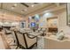 A bright and spacious lobby area featuring comfortable seating and elegant decor at 16101 Cape Coral Dr, Wimauma, FL 33598