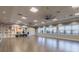 Bright and airy yoga studio with lots of natural light and custom shelving at 16101 Cape Coral Dr, Wimauma, FL 33598