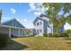 Private backyard showcasing lush greenery, a covered patio, and serene outdoor living space at 2009 153Rd E Ct, Bradenton, FL 34212
