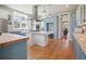 Spacious kitchen boasting a central island, stainless appliances, and hardwood floors at 2009 153Rd E Ct, Bradenton, FL 34212