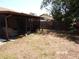 Spacious backyard featuring both open space and a screened-in patio area at 2025 Dover Ct, Oldsmar, FL 34677
