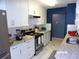 Bright kitchen with white cabinetry, stainless steel appliances, and modern finishes at 2025 Dover Ct, Oldsmar, FL 34677