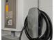 Tesla charging station mounted inside the garage, providing convenient electric vehicle charging at 2142 Scarlet Oaks St, Clearwater, FL 33759