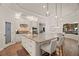 Contemporary kitchen boasting a spacious island, stainless steel appliances, and modern lighting at 2142 Scarlet Oaks St, Clearwater, FL 33759
