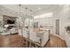 Beautiful kitchen with a large island, granite countertops, and stainless steel appliances at 2142 Scarlet Oaks St, Clearwater, FL 33759