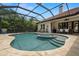 Pool area features a pool, spa, and patio furniture at 2142 Scarlet Oaks St, Clearwater, FL 33759