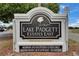 Entrance sign for Lake Padgett Estates East, a deed-restricted community at 23739 Forest View Dr, Land O Lakes, FL 34639