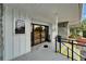 Entrance to the community clubhouse, featuring glass doors and accessible ramps at 23739 Forest View Dr, Land O Lakes, FL 34639