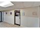 Charming hallway with tile floors and nautical decorations leading to the Double Dippers Restaurant at 23739 Forest View Dr, Land O Lakes, FL 34639