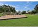 Park playground with monkey bars, slide and swingset at 23739 Forest View Dr, Land O Lakes, FL 34639