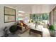 Relaxing screened porch with comfortable seating and serene outdoor views at 23739 Forest View Dr, Land O Lakes, FL 34639