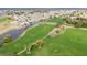 Beautiful aerial view of community with golf course, homes, and waterfront canals at 2413 Oxford Down Ct # 58, Sun City Center, FL 33573