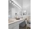 Bathroom featuring a vanity with dual sinks and ample lighting at 2413 Oxford Down Ct # 58, Sun City Center, FL 33573