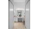 Bathroom showcasing dual sinks, vanity area, and a serene atmosphere at 2413 Oxford Down Ct # 58, Sun City Center, FL 33573