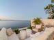 Stylish outdoor seating area with comfortable furniture and breathtaking waterfront views at 2807 W Hawthorne Rd # 11, Tampa, FL 33611